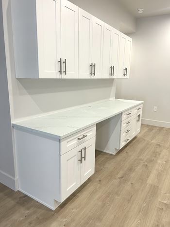 Kitchen area with cabinets